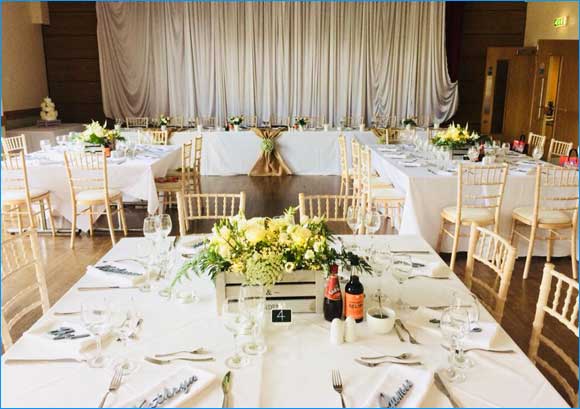 Image of hall set out for wedding party.